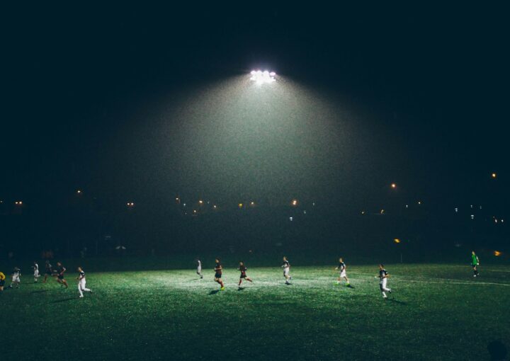 Football at night representing digital and sports technology
